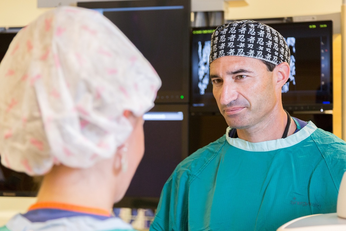 Woman talking to surgeon